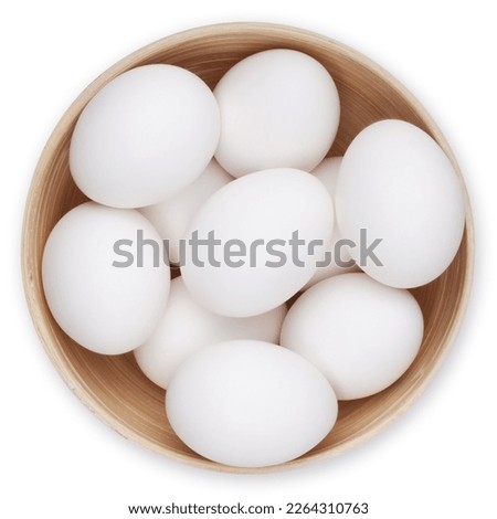 Basket full of white eggs, top view on white background. Happy Easter decorations, template for label, gift greeting card, advertising promotional banner or ticket price Royalty-Free Stock Photo #2264310763