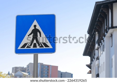 Post with traffic sign Pedestrian Crossing outdoors, space for text