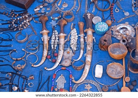 Various berber artefacts for sale in the souk of Aït Benhaddou, Morocco. Royalty-Free Stock Photo #2264322855