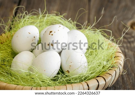 Easter composition with eggs in a decorative nest.