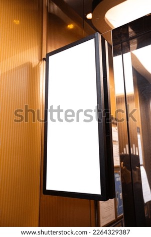 Blank monitor screen mock-up in an elevator