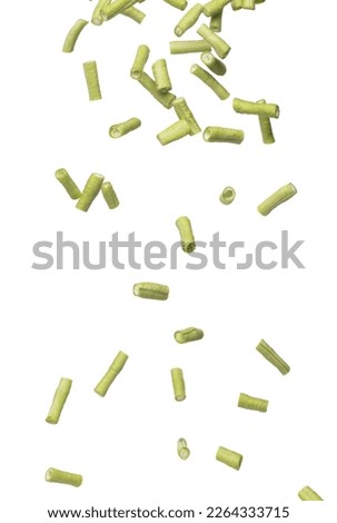 Chopped Long yard bean fly explosion, Cut green long beans for food cooking float in air. Raw slice long yard bean throw in mid air as food material. White background isolated high speed freeze motion Royalty-Free Stock Photo #2264333715