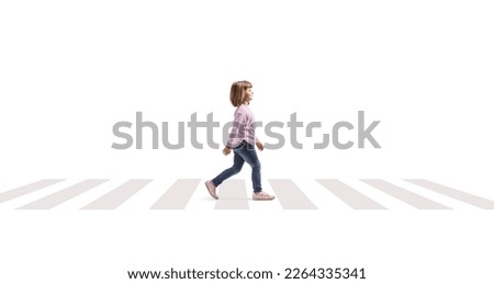 Child walking over pedestrian crossing isolated on white background Royalty-Free Stock Photo #2264335341