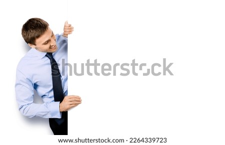 Portrait image of business man professional bank manager in confident cloth, tie. Businessman stand behind look at empty white banner signboard with copy space area. Isolated against white background