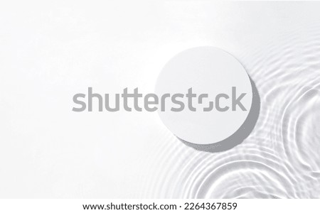 White round podium on the water surface background. Flat lay, copy space.	