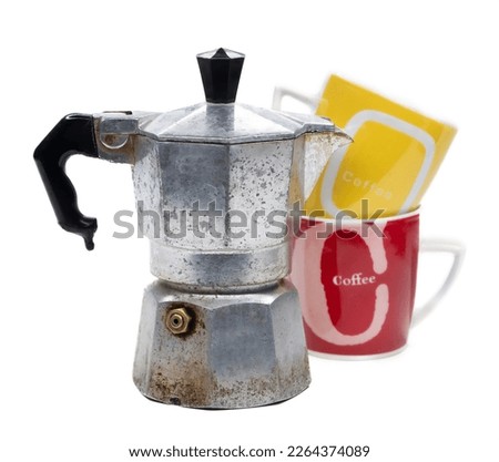 Isolated image of vintage moka pot and coffee cups