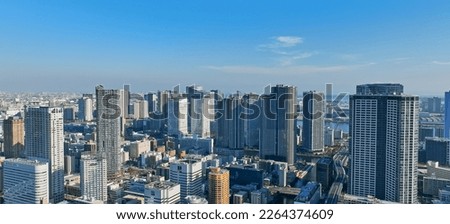 Modern urban waterfront city aerial view. Drone point of view. Royalty-Free Stock Photo #2264374609