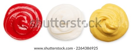 Ketchup, mustard and mayonnaise stains on white background. File contains clipping path. Royalty-Free Stock Photo #2264386925