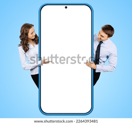 Collage image - businessman, businesswoman stand behind show big cell phone mobile smartphone. Business woman man hold peep overhang cellphone with white mockup screen isolate on sky blue background