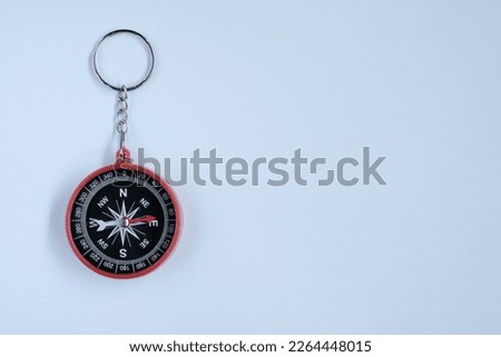 Pocket compass isolated white background. Selective focus