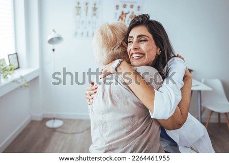 Senior woman, hug or medical caregiver in house living room in comfort trust, support or security bond. Smile, happy or laughing nursing home retirement elderly and healthcare nurse or help