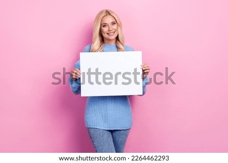 Photo of adorable pretty lovely lady wear comfort clothes presenting empty space new collection isolated on pink color background