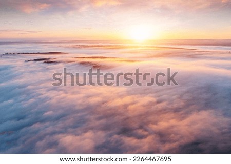 Fantastic scene of plain in the fog from a bird's eye view. Location place Dniester canyon, Ukraine, Europe. Aerial photography, drone shot. Perfect natural wallpaper. Discover the beauty of earth.