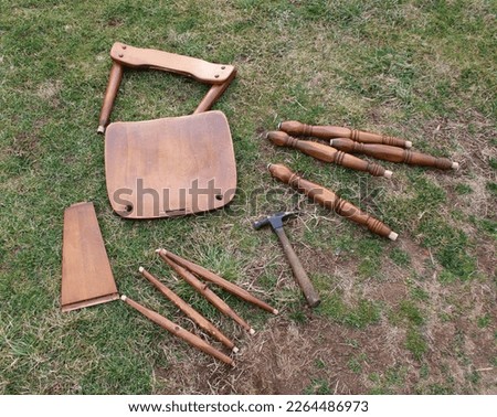 A Disassembled Colonial Maple Chair Royalty-Free Stock Photo #2264486973