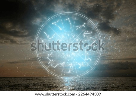 Zodiac wheel with 12 astrological signs and star constellations and seascape on background