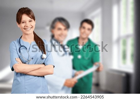 Portrait of young doctor or nurse at hospital