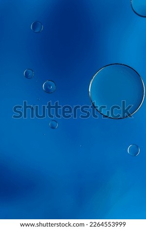 Abstract colorful bubbles. Soft background with blue tones and circles.