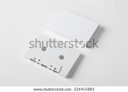 Blank audio cassette on white background with blank packaging