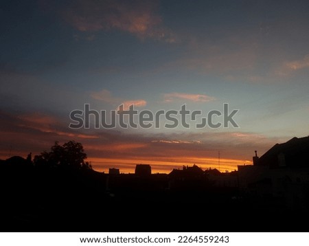 
Sunset sky over a French city