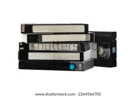 Pile of VHS video cassettes. Vintage media. Isolate on a white background. Royalty-Free Stock Photo #2264566705