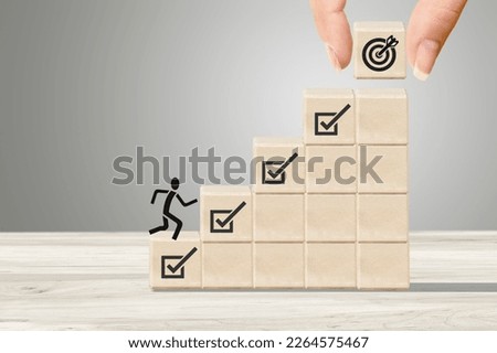 Set of wooden cube blocks with target Royalty-Free Stock Photo #2264575467