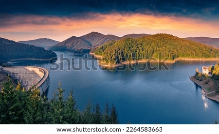 Spectacular summer sunrise on Dragan lake. Adorable morning view of Apuseni Natural Park. Incredible outdoor scene of Romania, Europe. Beauty of nature concept background. Royalty-Free Stock Photo #2264583663