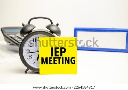 Retro alarm clock and the text iep meeting