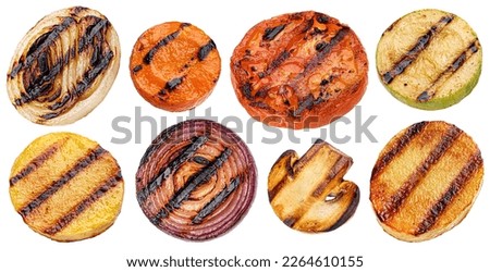 Falling grilled vegetable slices isolated on white background Royalty-Free Stock Photo #2264610155