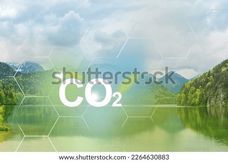 Pure water of lake in the mountains — protecting nature for future generations. Problems and solutions of CO2 emission. Royalty-Free Stock Photo #2264630883