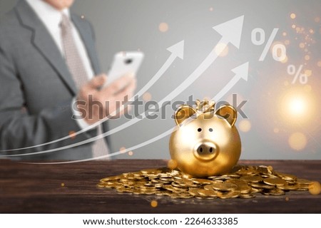 Stack of golden coins with arrow icon, financial concept.