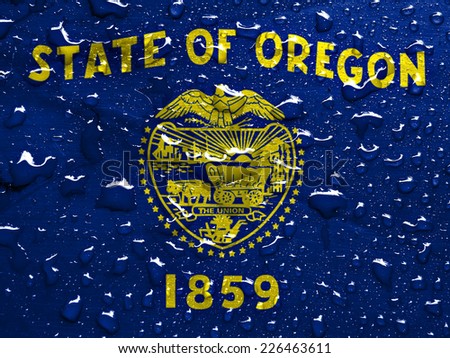 flag of Oregon with rain drops