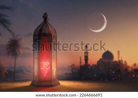 Ornamental Arabic lantern with burning candle glowing at night mosque background. Festive greeting card, invitation for Muslim holy month Ramadan Kareem. Royalty-Free Stock Photo #2264666691
