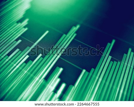 Data information graph with green bar chart displayed on a pixelated monitor with a dark blue background