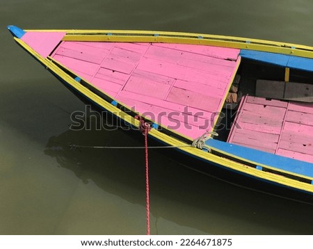 Colourful boat on a river in India