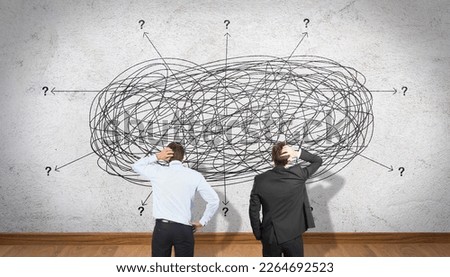 Business Team Thinking in Solving Difficult and Complex Problem Concept. Confused People Wonder at Perplexed Complex Messy Line. Teamwork and Brainstorming Idea Royalty-Free Stock Photo #2264692523