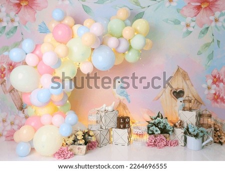 Personalized romantic enchanted garden decor, with colorful balloon arch and dolls, enchanted garden illustration, for studio photo shoots.

Great for family rehearsals and also for smash the cake.