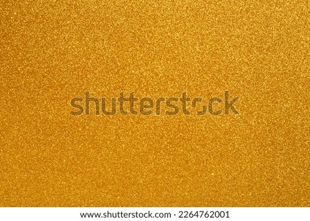 Gold glitter texture. Gold glitter background.