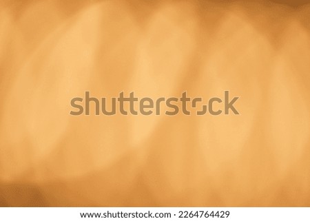 Bokeh golden brown color beam design abstract background. Blur light overlay. Lens flare rays. Defocused glare.
