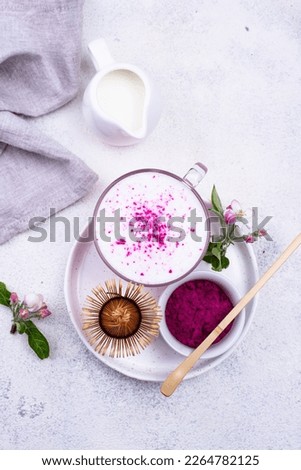 Pink matcha latte with milk