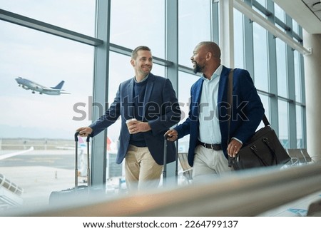 Travel for business, team at airport and men, catch flight for work trip with conference or training seminar with accountant. Walk, talk and diversity with finance convention and partnership Royalty-Free Stock Photo #2264799137
