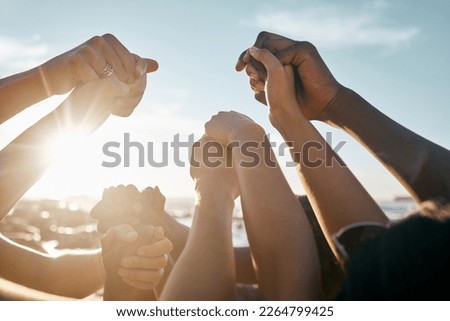 Friends, bonding and holding hands on beach social gathering, community trust support or summer holiday success. Men, women and diversity people in solidarity, team building or travel mission goals Royalty-Free Stock Photo #2264799425
