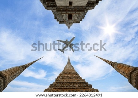 Airplane on the sky over Thailand grand palace, wat phra kaew and wat pho in Bangkok city, Thailand. The best travel destination in Asia Royalty-Free Stock Photo #2264812491