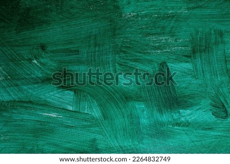 Modern contemporary acrylic background. Paint texture made with brush. Green brush strokes painting on canvas