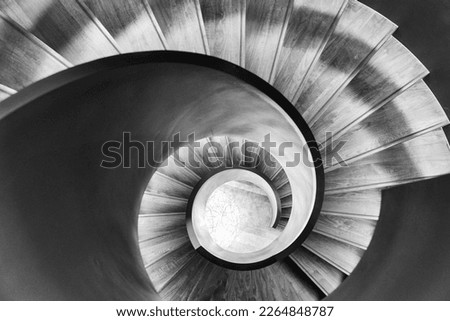 view of a spiral staircase from above Royalty-Free Stock Photo #2264848787