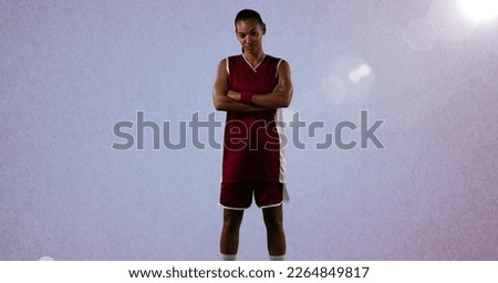 Composition of female basketball player with arms crossed with copy space. sport and competition concept digitally generated image.