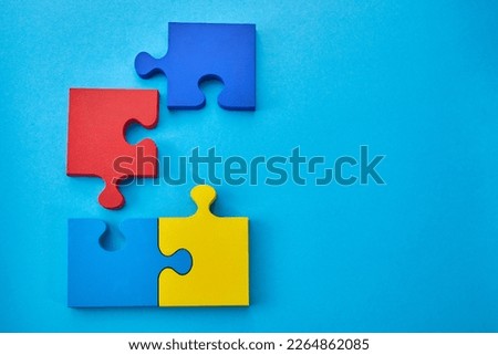 Color puzzle symbol of public awareness for autism spectrum disorder. World Autism Awareness Day.