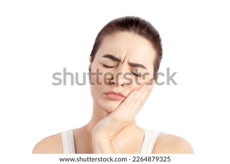 The woman has a toothache. need a dentist. Closeup portrait white background