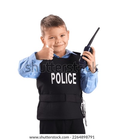 Funny little police officer with radio transmitter showing thumb-up on white background