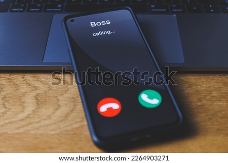 Phone call from boss. Incoming call from boss concept. High quality photo Royalty-Free Stock Photo #2264903271