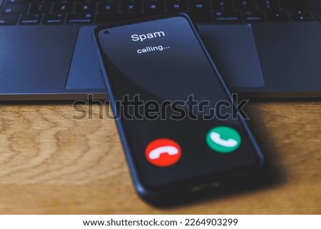 Spam call on phone. Spammer incoming call concept. High quality photo Royalty-Free Stock Photo #2264903299
